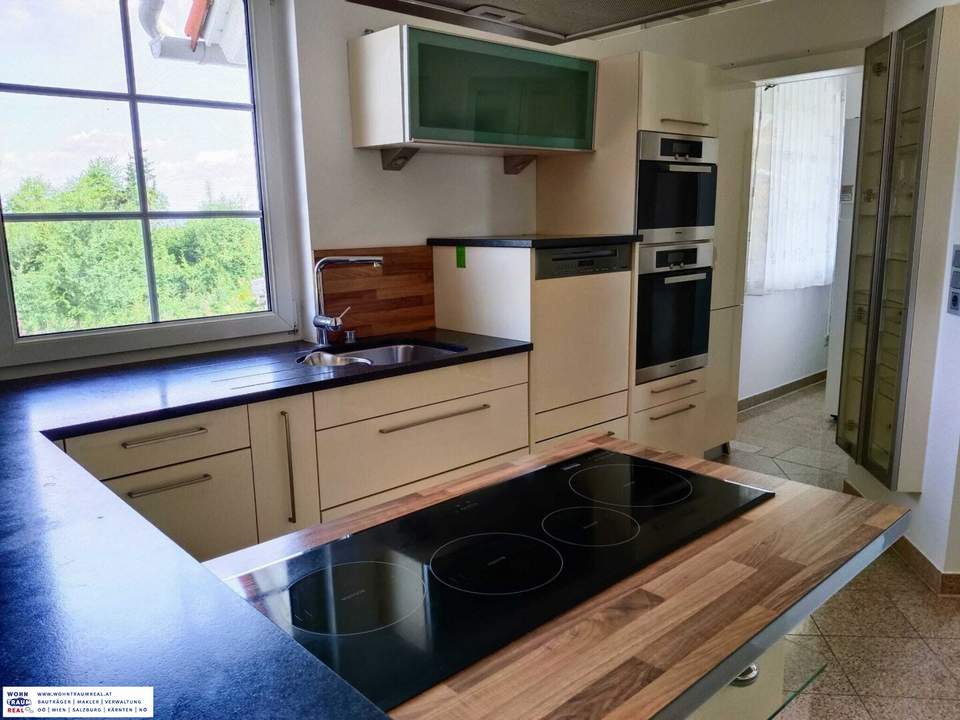 Luxusvilla mit großzügigem Garten, Pool und 3 Garagen in idyllischer Lage!