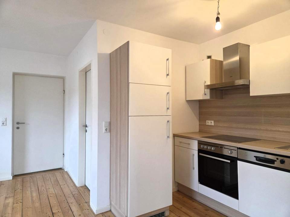 Perfekte Single-Wohnung mit Küche + PKW-Abstellplatz - PROVISIONSFREI