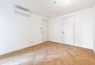 THE FUSION! Zentral begehbarer, hofseitiger Zwei-Zimmer-Erstbezug