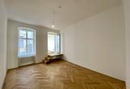 WIEN MITTE: Charmante, generalsanierte 4 Zimmer Altbauwohnung mit großzügiger Loggia