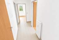 Moderne Neubauwohnung mit Balkon in zentraler Lage