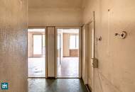 SANIERUNGSBEDÜRFTIGE 2 - ZIMMER WOHNUNG MIT FREIFLÄCHE UND GRÜNBLICK
