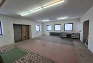 Mehrfamilienhaus mit Geschäftslokal