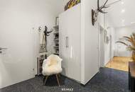 Wohnen über den Dächern von Graz mit Blick auf den Schlossberg: Exklusive Stadtwohnung mit Terrasse