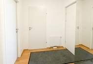 NEUWERTIGE 3-ZIMMER-WOHNUNG MIT LOGGIA UND EIGENEM GARAGENPLATZ