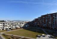 Top vermietete Anlegerwohnung mit Balkon und Tiefgarage - Neuwertig!