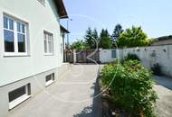 Modernes Einfamilienhaus mit großzügiger Lagerhalle/Werkstatt in zentraler Lage!