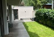 Neuwertige 4-Zimmer-Premiumwohnung möbliert mit 2 Bädern, Eigengarten & 2 Stellplätzen.