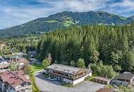 3.800 m² Baugrund mit Kaiser-, Hahnenkamm- und Südberge-Blick