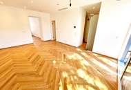 Ein Altbau, der verzaubert! Umfangreich und hochwertig sanierte Wohnschönheit mit großem Balkon und effizienter Erdwärme! Viel Privatsphäre + Viel Raum + Viel Grün!