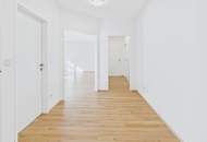 Moderne Erdgeschosswohnung mit Garten, Garage und Blick ins Grüne