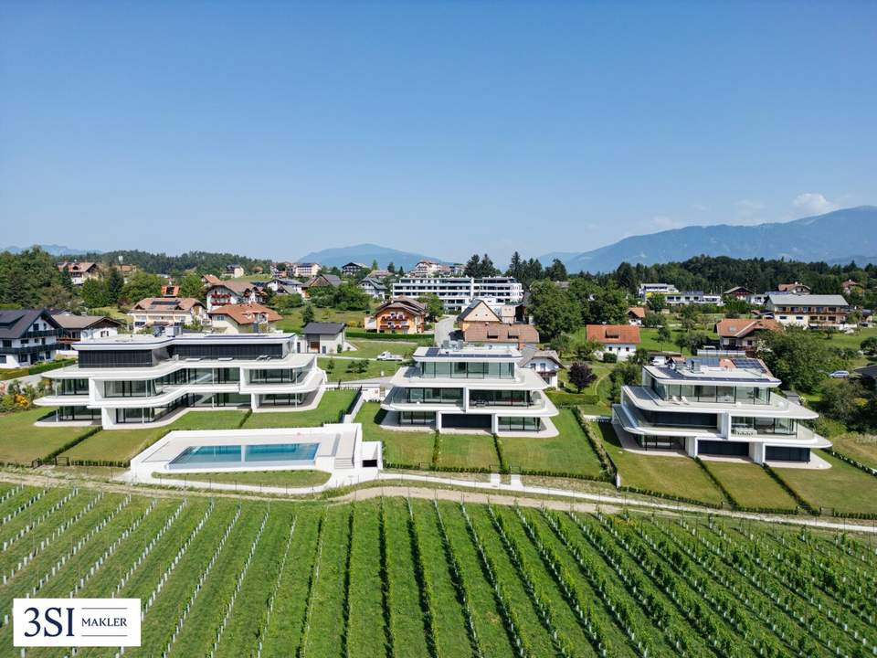 Luxus am Faaker See: Wohnen mit Privatstrand, Pool, Garten und großzügiger Dachterrasse