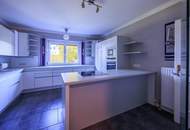 Mehrfamilienhaus mit Park