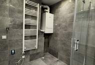 Erstbezug mit Augartenblick – Stilvolle 3-Zimmer-Wohnung mit durchdachtem Grundriss in zentraler Ruhelage