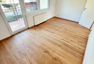 Neuer Preis! Ruheoase im Grünen! Sonnig. Saniert. Einfach super! Erstbezug mit Wohlfühlfaktor! 4 Zimmer + 2 Balkone + Garagenplatz + Hochwertige Einbauküche! Grün wohin das Auge reicht!