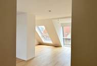 Eleganz trifft Lage – Neubau-Dachgeschosswohnung in Toplage