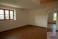 Wunderschöne neue Obergeschoss-Wohnung mit Eigengarten zu verkaufen!