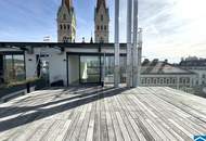 Spektakuläre Dachgeschoßmaisonette mit Terrassentraum und Blick auf die Canisiuskirche