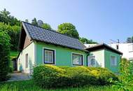 Großes Grundstück in Top-Aussichtslage mit gut vermietbarem Häuschen