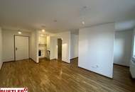 Helle Neubauwohnung mit Terrasse!