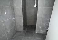 Modernes Zweifamilienhaus mit Gartenwohnungen – Erstbezug!