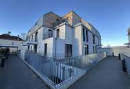 Erstbezug: 3 Zimmer-Mietwohnung mit sonnigen Terrassenflächen und Garten