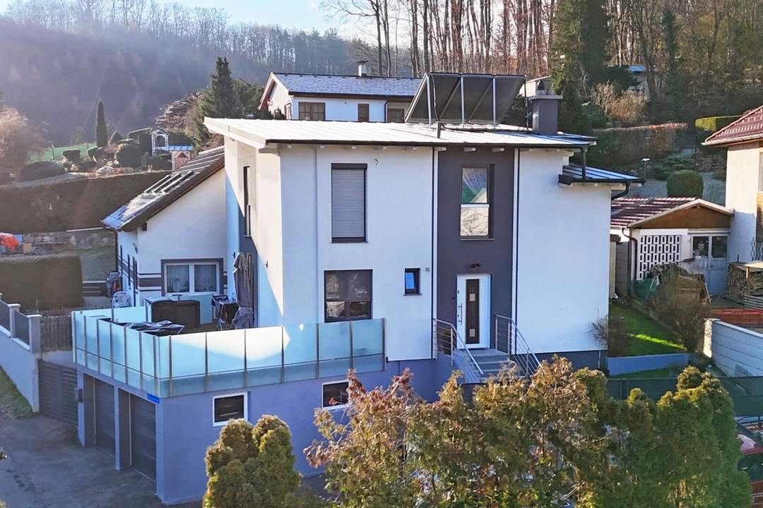 Ihr neues Zuhause in zentrumsnaher Siedlungslage: toller Ausblick, Doppelgarage und Solaranlage!