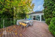 Elegantes Einfamilienhaus am See mit großzügiger Terrasse und Garten