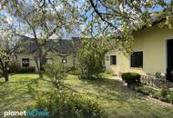 Ebenerdiges Wohnhaus inklusive Einliegerwohnung und romantischem Bauerngarten!