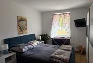 Wohlfühlen leicht gemacht: helle Räume und eine einladende Atmosphäre machen diese 2-Zimmer-Wohnung mit offener Küche zu einem schönen Zuhause in ruhiger Grünlage - ab Dezember verfügbar!