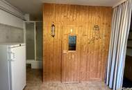 Einfamilienhaus mit unverbaubarem Waldblick auf großzügigem Hanggrundstück in Breitenfurt