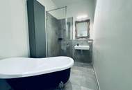 Hugerburg: Loftartige Designerwohnung mit Terrasse und Tiefgaragenstellplatz