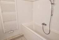 EIGENGARTEN, LORYSTRASSE, 75 m2 Neubau mit 23 m2 Garten, 2 Zimmer, Wohnküche, Wannenbad, Parketten, 1. Liftstock
