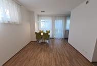 Sofort beziehbar! Neubauwohnung mit neuer Küche, 10m2 Balkon, Parkplatz und Grünblick - Fernwärme