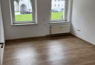 Einladendes Wohnambiente und praktische Raumaufteilung: gemütliche 3-Zimmer-Wohnung mit Grünblick bietet die perfekte Kombination aus naturnahem Wohnen und ausgezeichneter Infrastruktur in Stadtnähe!