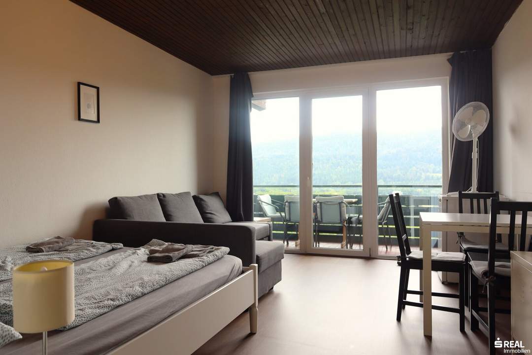 Charmante Dachgeschosswohnung mit Panoramablick - inklusive Loggia und Carport!