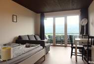 Charmante Dachgeschosswohnung mit Panoramablick - inklusive Loggia und Carport!
