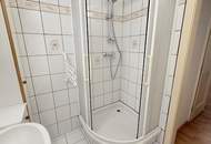 Karmeliterplatz-Charme trifft modernen Komfort – 2-Zimmer-Neubauwohnung mit Stellplatz im Innenhof.