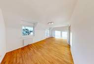 Helle Dachgeschosswohnung mit sonniger 7 m² Westterrasse und Garagenplatz in absoluter Ruhelage