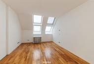 Altbau trifft Moderne – Wohnen über den Dächern