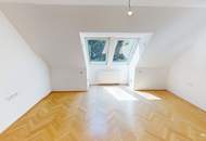 Elegante Dachgeschosswohnung mit Gartenblick, Terrassen und Garage