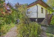Charmantes Einfamilienhaus mit Terrasse, Garage und Kamin in Götzendorf, sanierungsbedürftig