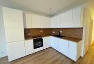 2-Zimmer Neubauwohnung mit Balkon und TG Platz!