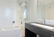 Exclusive Vienna duplex with sun-filled glass front, outdoor areas & St. Stephen’s Cathedral View