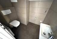 Helle 3-Zimmer Neubau Maisonette-Wohnung mit 2 Terassen, Wohnküche, Gartennutzung, Kellerabteil und Garagenplatz optional
