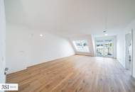 Großzügige Wohnküche als Herzstück der Wohnung