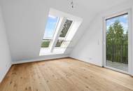 Erstbezug – moderne 2-Zimmer-Dachgeschosswohnung mit Terrasse und Weitblick