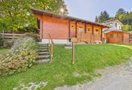 Sonnberg - Ruheoase mit Mittagskogelblick: Blockhaus auf 660m² Bauland in Finkenstein am Faaker See