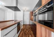 Zuhause im Grünen – Lichtdurchflutete Wohnung mit Dachterrasse & Gartenoase