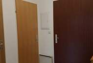 Möblierte 2-Zimmer-Wohnung mit Balkon, Grünblick und Tiefgarage in absoluter Ruhelage